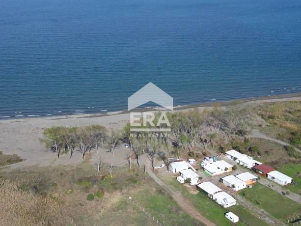 ПАРЦЕЛ НА ПЪРВА ЛИНИЯ МОРЕ – Къмпинг „Тополи“, плаж „Вромос“, Атия
