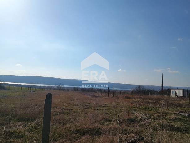 Урегулиран поземлен имот с одобрен ПУП в с. Тополи за продажба, с площ от 658 кв.м